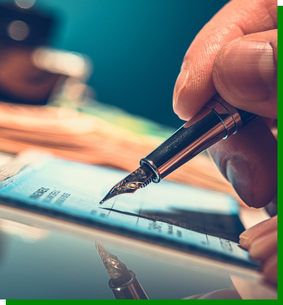 Person writing a check