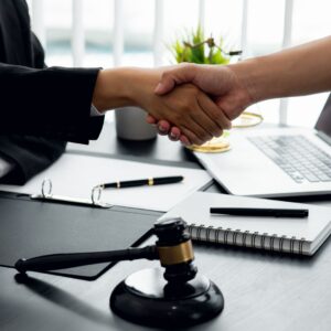 lawyer shaking hands with client