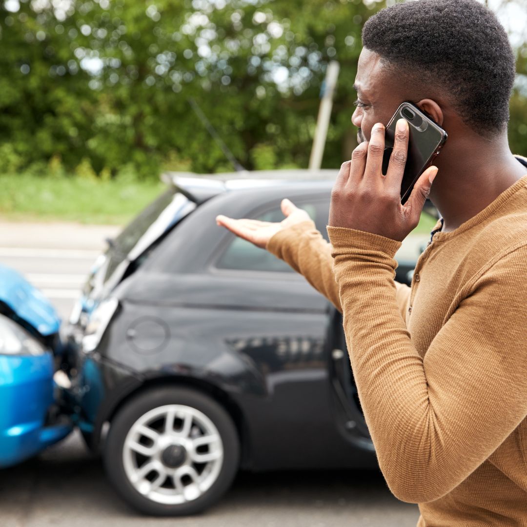 man on phone with insurance company